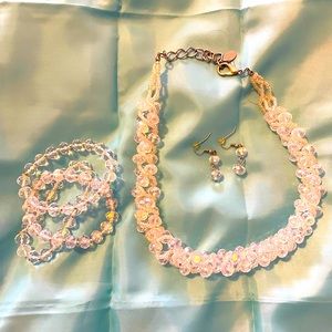 Beautiful crystal bead necklace with 3 bracelets and earrings.